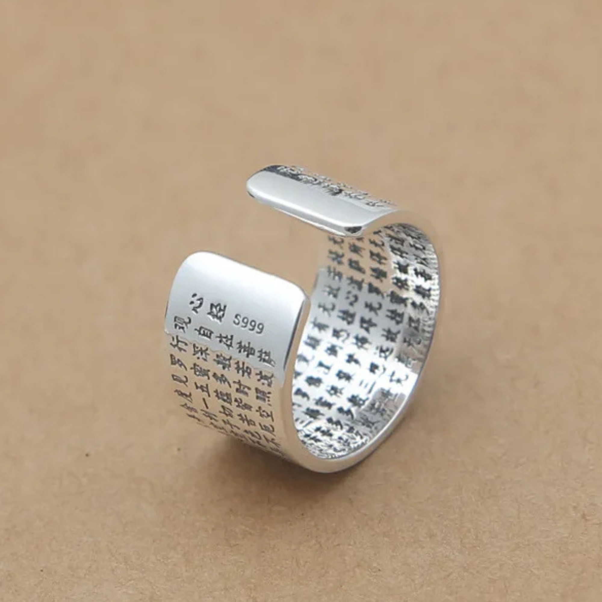 Artisan d'Asie Bagues Bague ajustable gravée sutra du coeur en argent 990