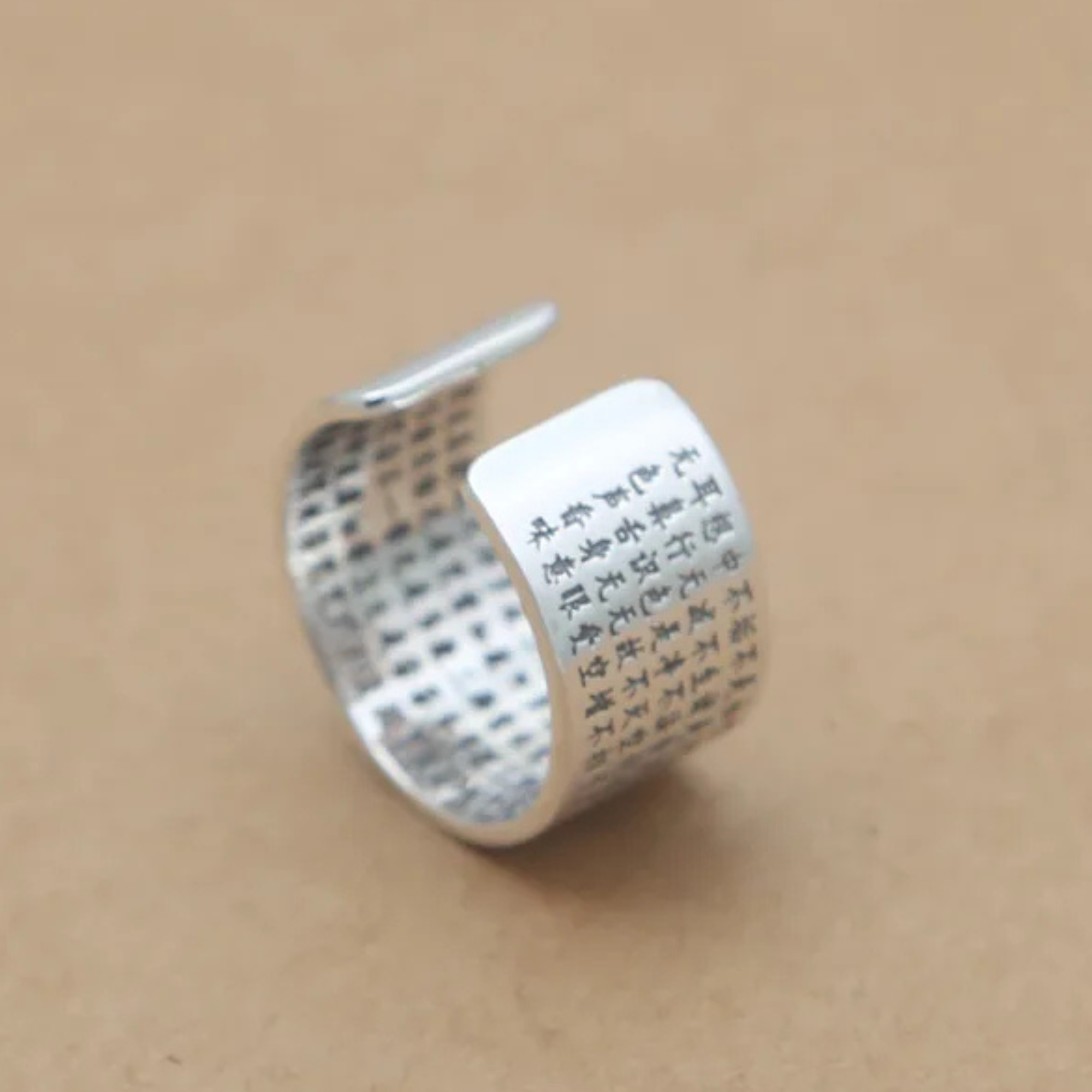 Artisan d'Asie Bagues Bague ajustable gravée sutra du coeur en argent 990