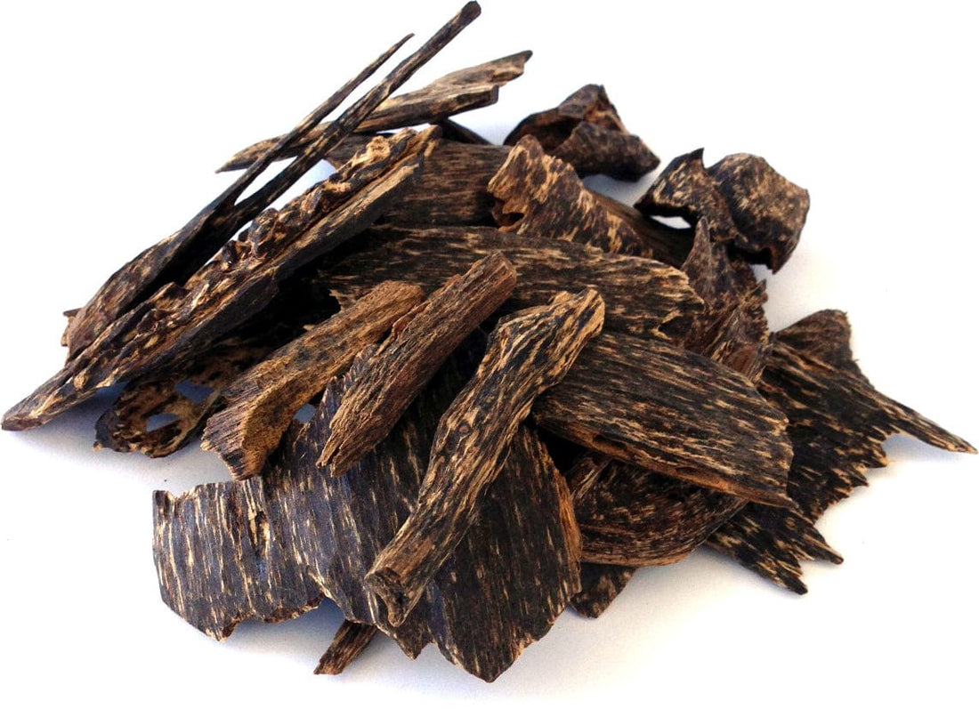 Oud wood black dense resin with a luxurious scent used in perfumes and meditation. Authentic handmade Oud wood products for a unique sensory experience.
