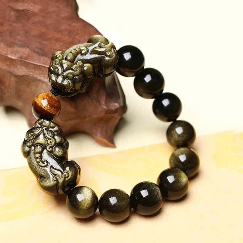 Artisan d'Asie Bracelets Malas Bracelet mala avec pixiu en obsidienne dorée et oeil de tigre