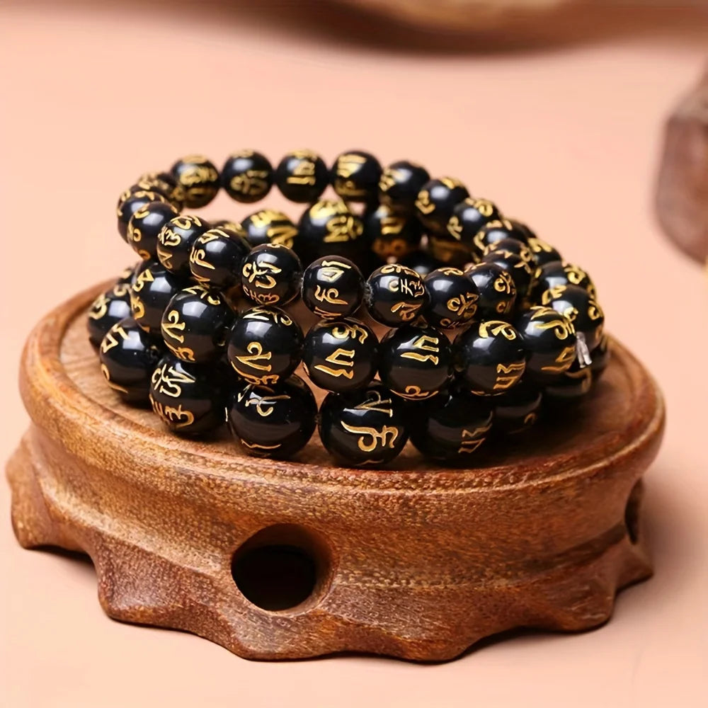 Artisan d'Asie Bracelets Malas Bracelet mala en pierre d'agate noire motif om mani padme hum