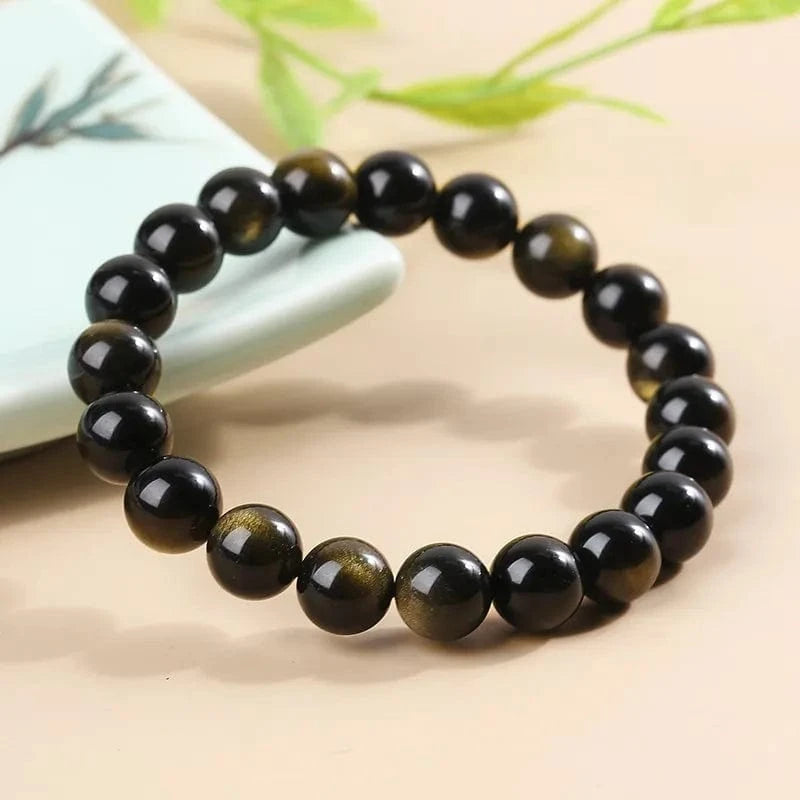 Artisan d'Asie Bracelets Malas Bracelet mala en pierre d'obsidienne dorée