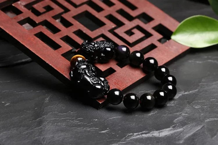 Artisan d'Asie Bracelets Malas Bracelet mala en pierre d'obsidienne et oeil de tigre