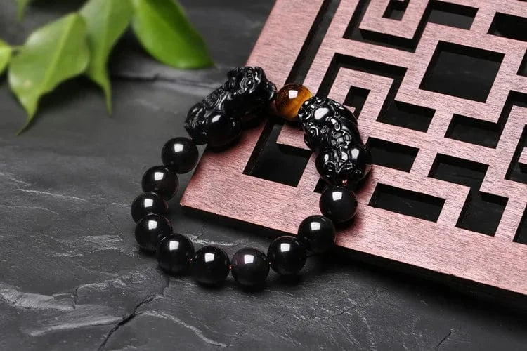 Artisan d'Asie Bracelets Malas Bracelet mala en pierre d'obsidienne et oeil de tigre