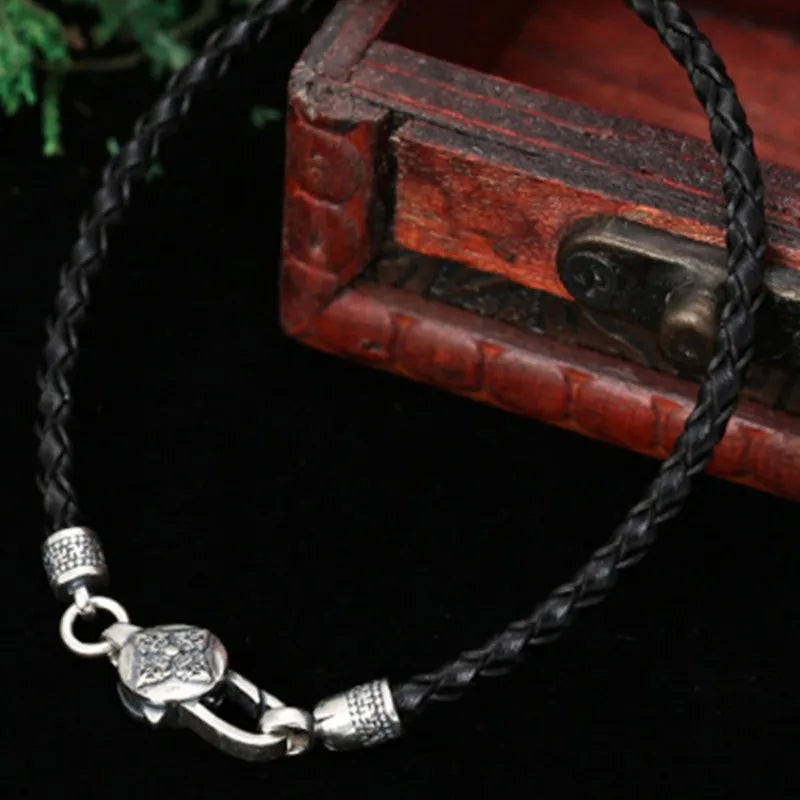 Artisan d'Asie Bracelets Tressés Tibétains Bracelet en argent sterling 925 et cuir tressé – Six Mantras & Vajra Pestle