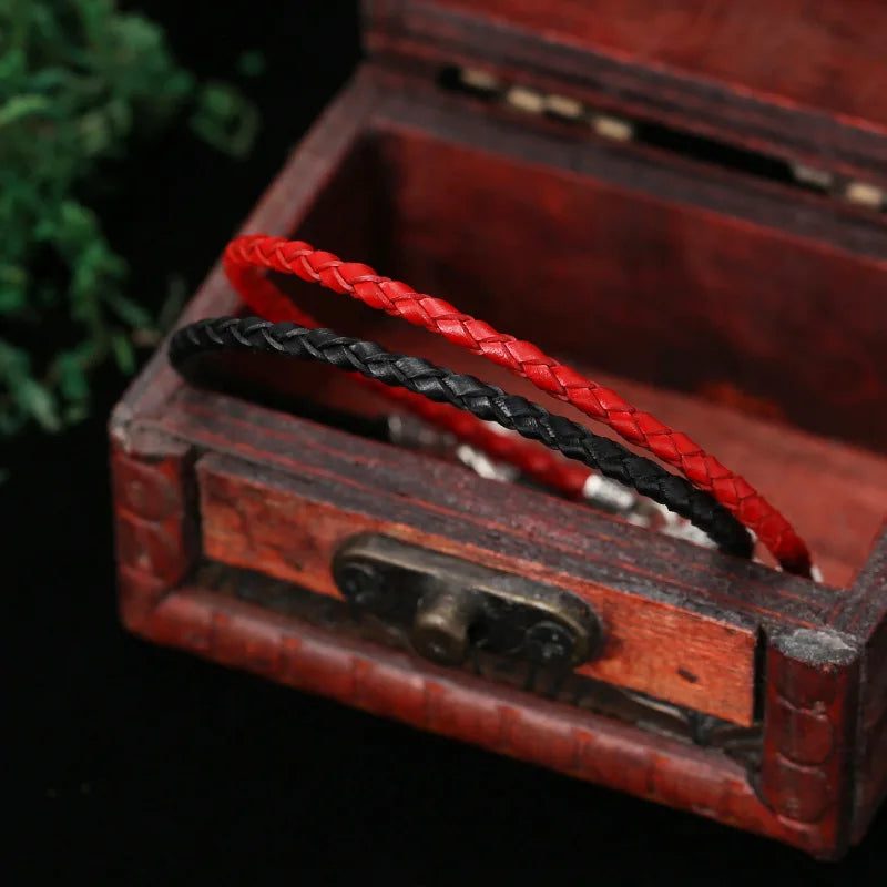 Artisan d'Asie Bracelets Tressés Tibétains Bracelet en argent sterling 925 et cuir tressé – Six Mantras & Vajra Pestle