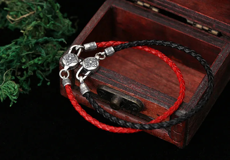 Artisan d'Asie Bracelets Tressés Tibétains Bracelet en argent sterling 925 et cuir tressé – Six Mantras & Vajra Pestle
