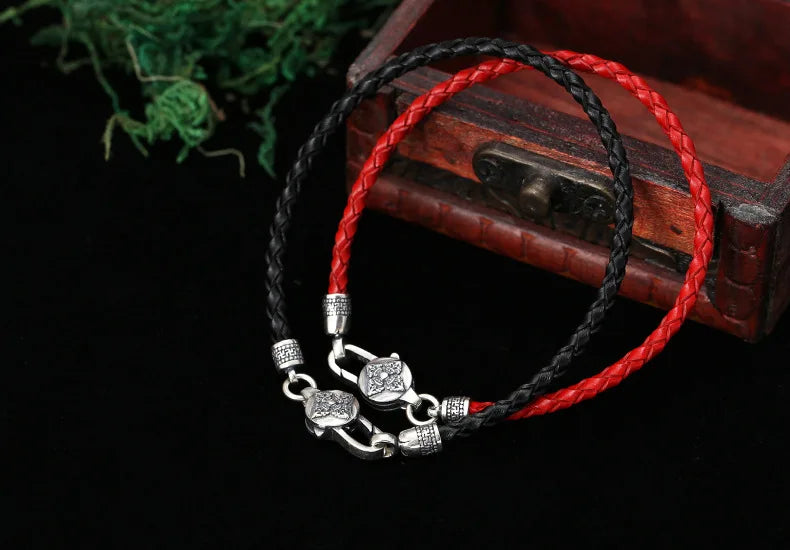 Artisan d'Asie Bracelets Tressés Tibétains Bracelet en argent sterling 925 et cuir tressé – Six Mantras & Vajra Pestle