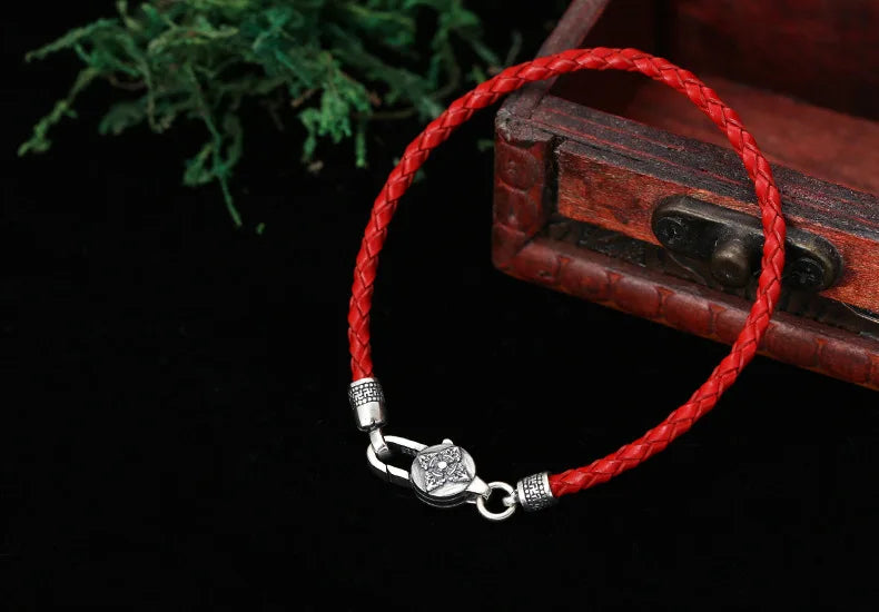 Artisan d'Asie Bracelets Tressés Tibétains Bracelet en argent sterling 925 et cuir tressé – Six Mantras & Vajra Pestle