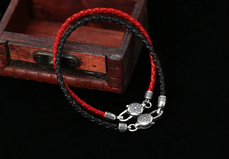 Artisan d'Asie Bracelets Tressés Tibétains Bracelet en argent sterling 925 et cuir tressé – Six Mantras & Vajra Pestle