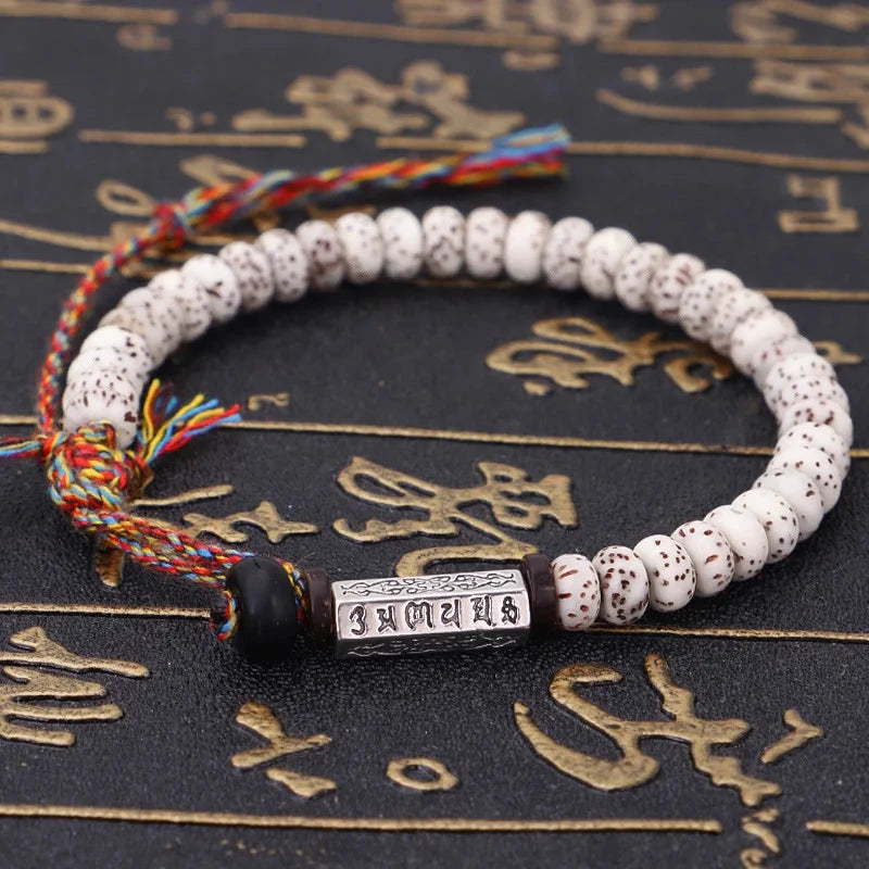 Artisan d'Asie Bracelets Tressés Tibétains Bracelet tibétain tressé à la main avec des graines Xingyue
