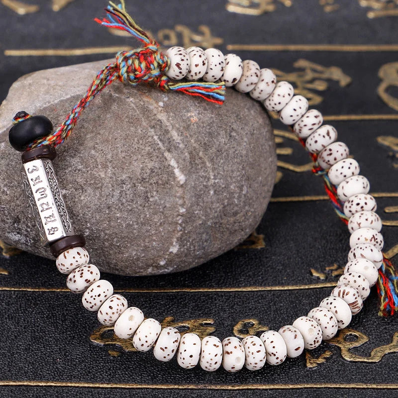 Artisan d'Asie Bracelets Tressés Tibétains Bracelet tibétain tressé à la main avec des graines Xingyue