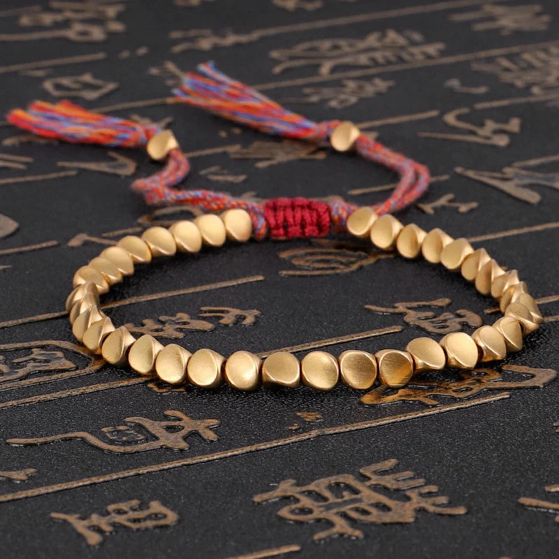 Artisan d'Asie Bracelets Tressés Tibétains Bracelet tibétain tressé à la main avec des perles de cuivre tibétaines