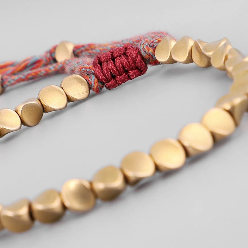 Artisan d'Asie Bracelets Tressés Tibétains Bracelet tibétain tressé à la main avec des perles de cuivre tibétaines