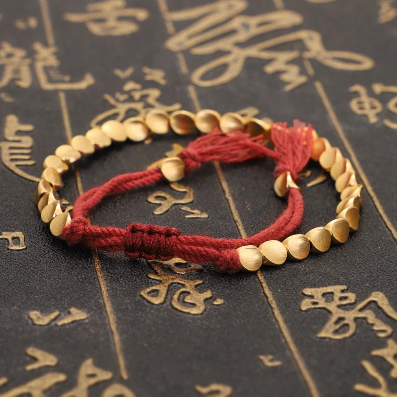 Artisan d'Asie Bracelets Tressés Tibétains Bracelet tibétain tressé à la main avec des perles de cuivre tibétaines
