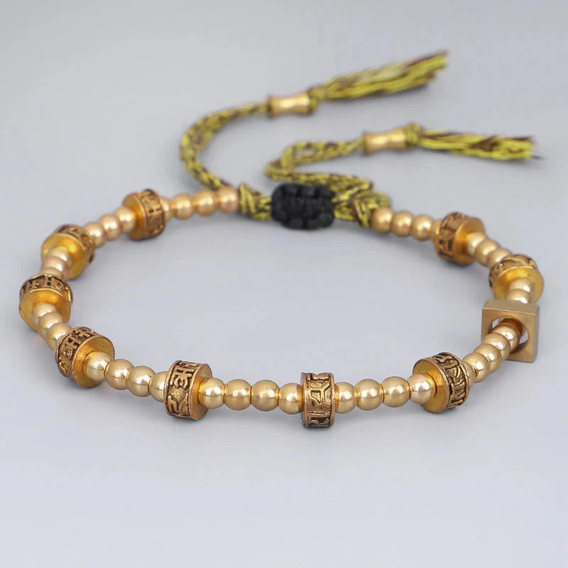 Artisan d'Asie Bracelets Tressés Tibétains Bracelet tibétain tressé à la main avec perles en cuivre tibétaines