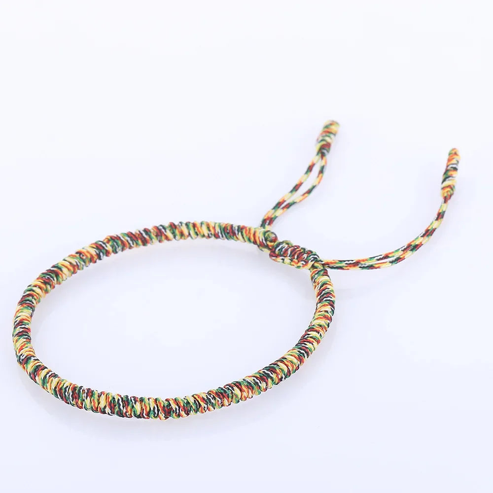 Artisan d'Asie Bracelets Tressés Tibétains Jaune Multicolore Bracelet tibétain tressé à la main rouge, rouge foncé et jaune multicolore