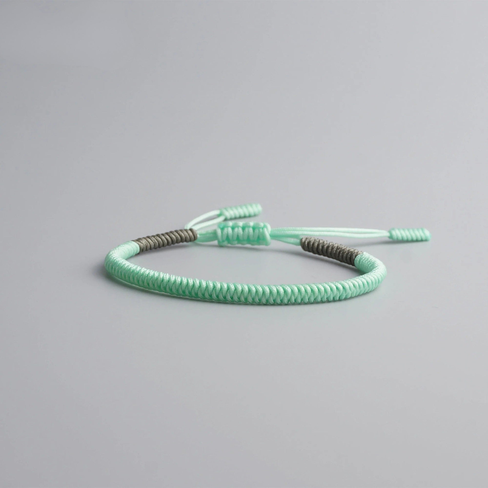 Artisan d'Asie Bracelets Tressés Tibétains Vert Menthe Bracelet Tressé Bouddhiste Tibétain - Nœud Coulissant Porte Bonheur (Rose / Vert Menthe / Gris / Violet)