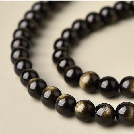 Artisan d'Asie Colliers Malas Collier mala en pierre d'obsidienne dorée