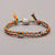 Artisan d'Asie Bracelets Tressés Tibétains Ananais - Noir Bracelet Tibétain tressé à la main multicolore avec une amulette aux choix