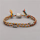 Bracelet Tibétain tressé à la main multicolore avec une amulette aux choix Bracelets Tressés Tibétains Artisan d'Asie Boudda - Noir