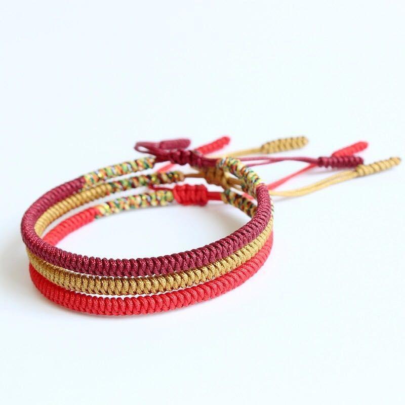 Bracelet tibétain tressé à la main rouge et or