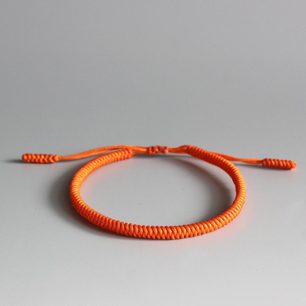 Bracelet tressé tibétain orange
