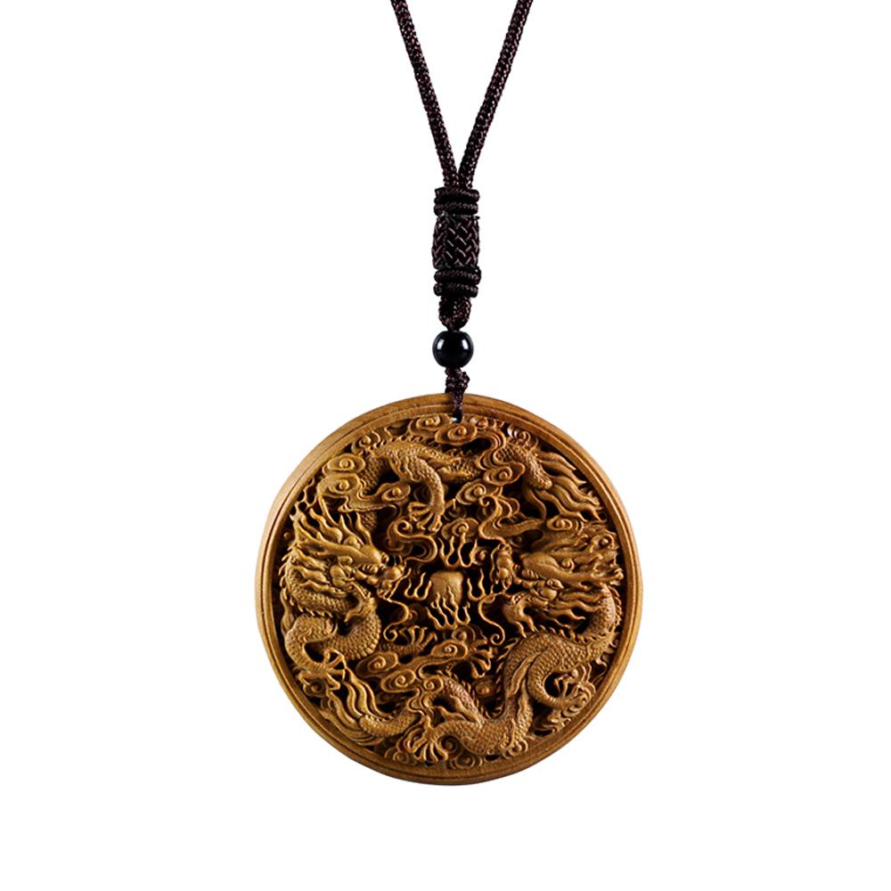 Pendentif Feng Shui Dragon en Bois de Santal Pendentifs & Amulettes Artisan d'Asie 